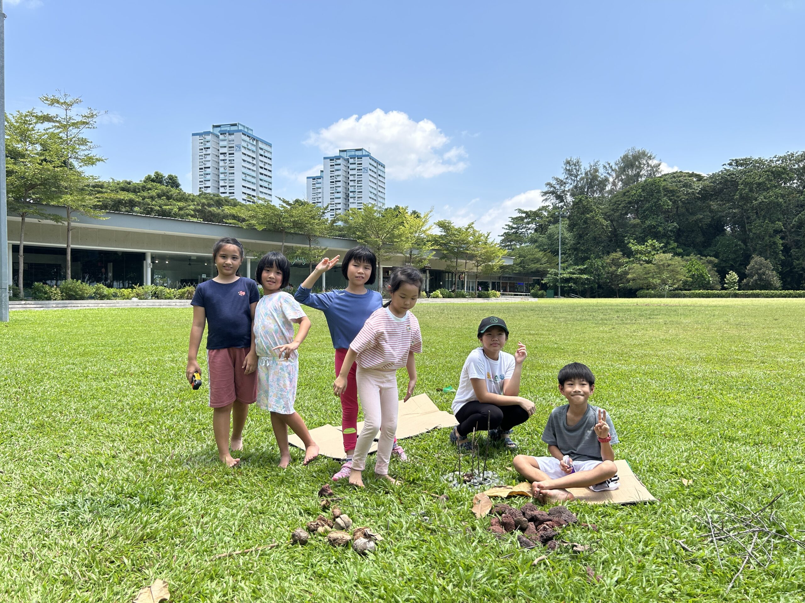 Children doing group circle exercise at Singapore mindfulness holiday camp