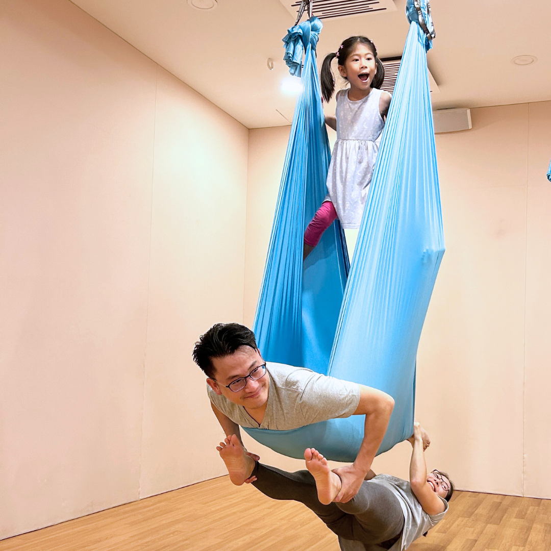 Family aerial yoga session, Mindful Space Singapore