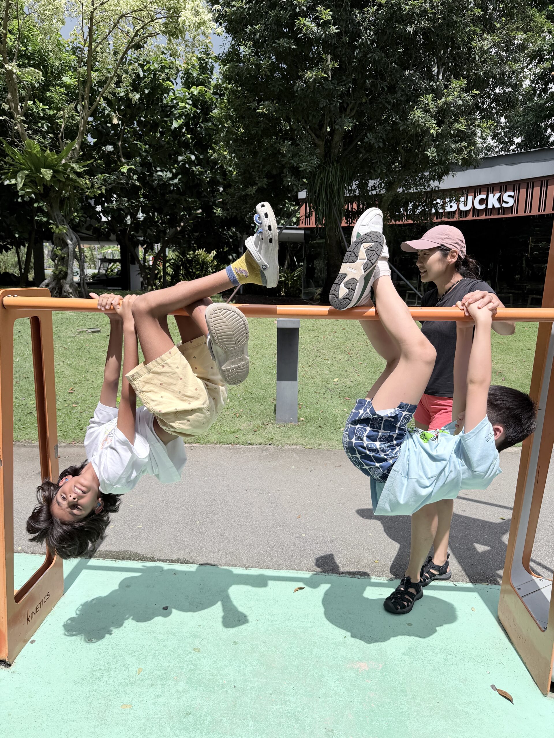 Child practising body awareness and balance at Singapore holiday camp