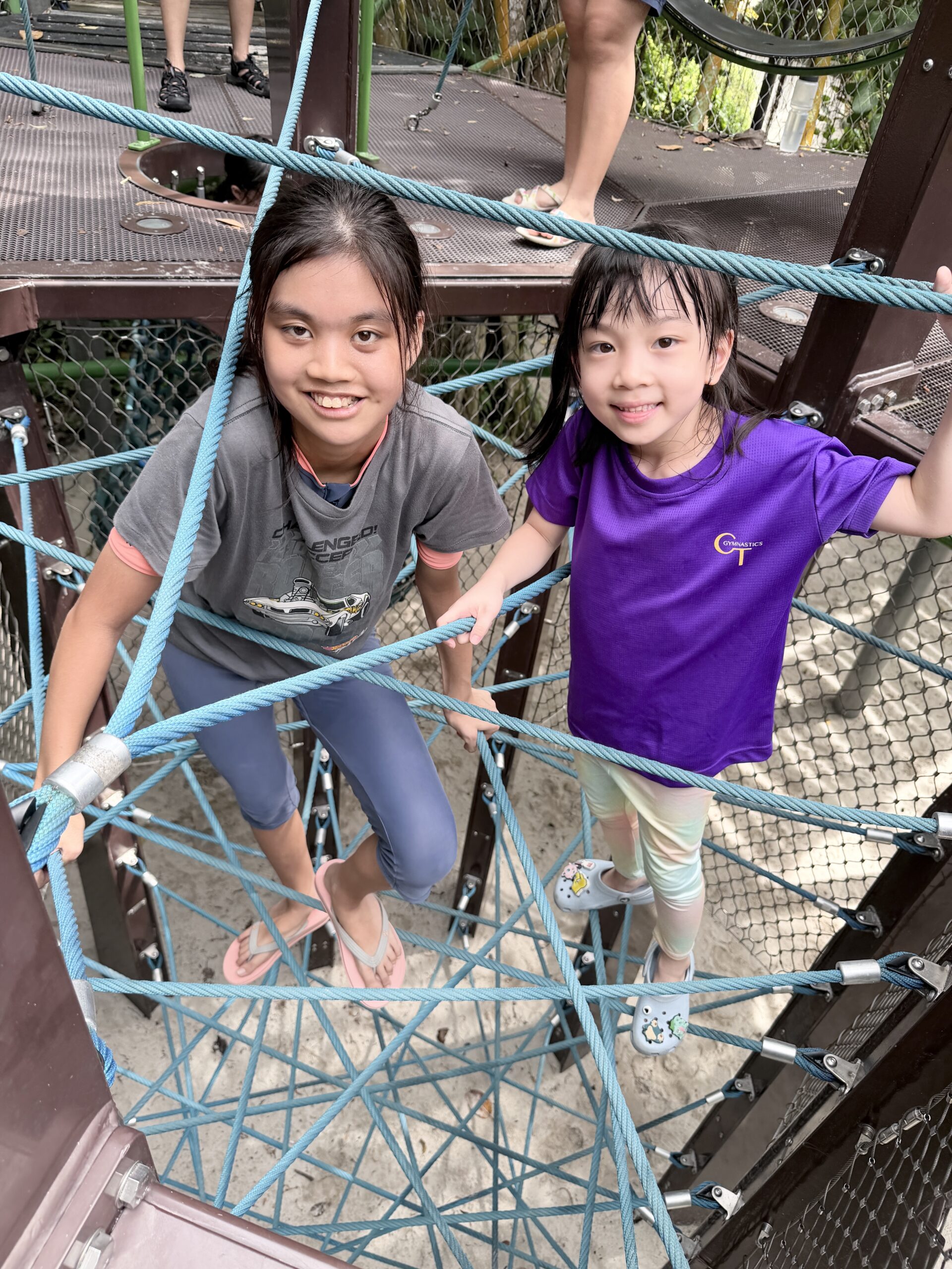 Child practising body awareness and balance at Singapore holiday camp closing day